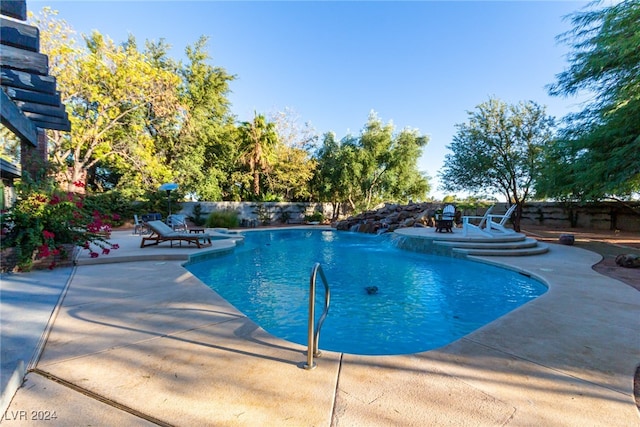 view of swimming pool featuring a patio