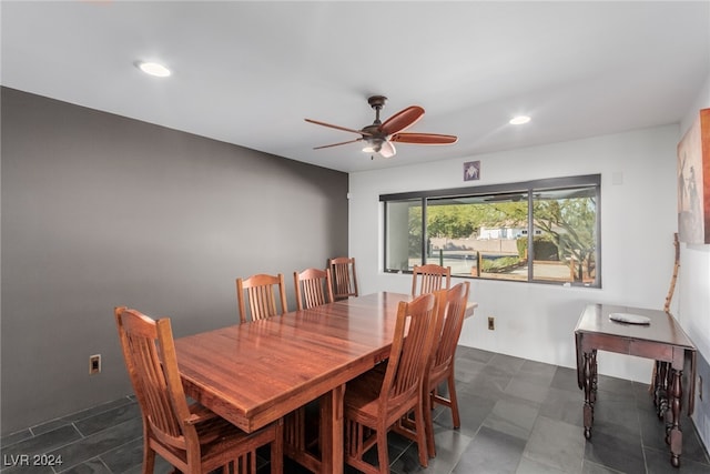 dining space featuring ceiling fan