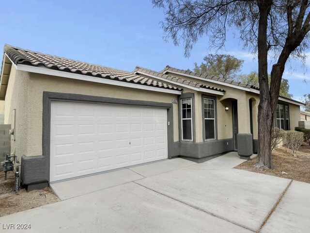 ranch-style house with a garage