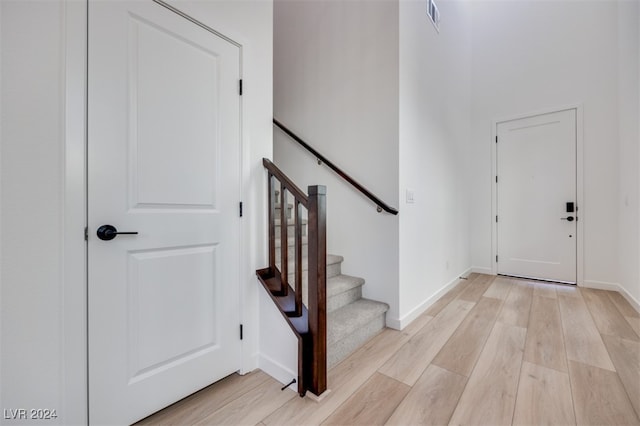 entrance foyer with light wood-type flooring