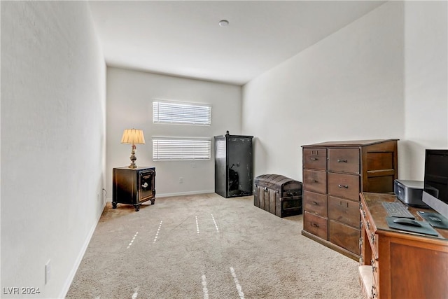 carpeted office with baseboards