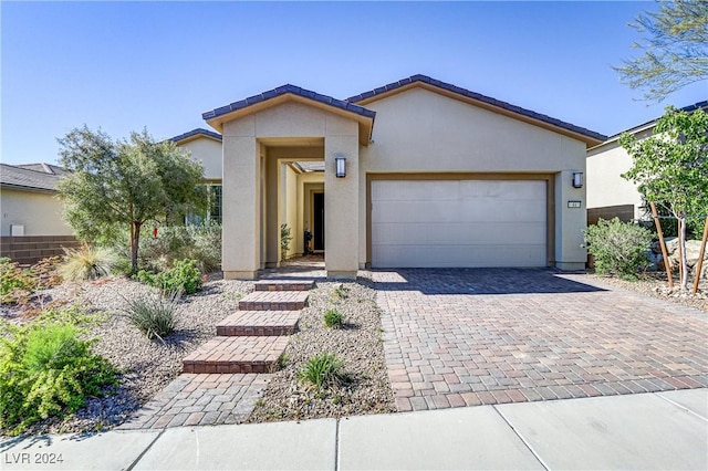 view of front of home featuring a garage