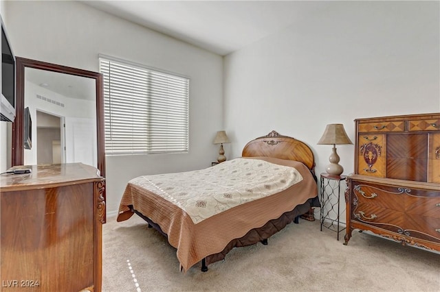 bedroom with carpet flooring and visible vents