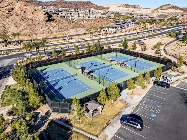 birds eye view of property featuring a mountain view