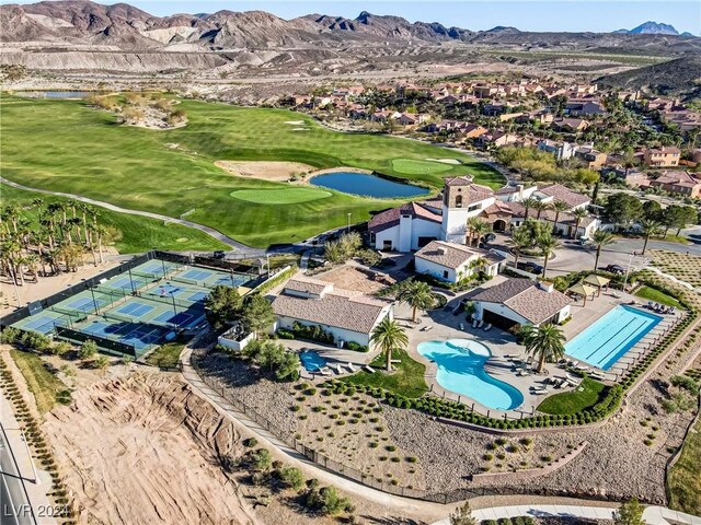 birds eye view of property featuring a mountain view