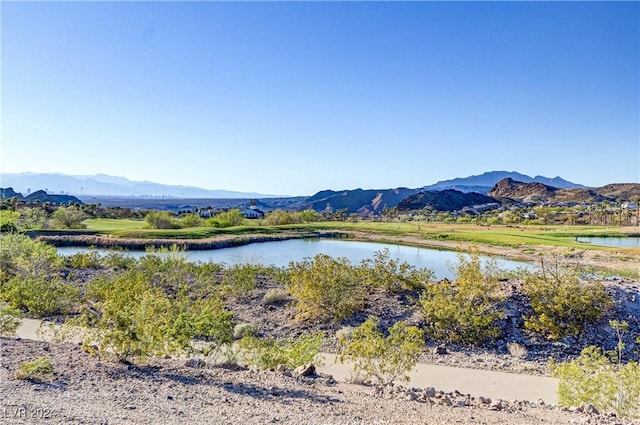 view of mountain feature featuring a water view