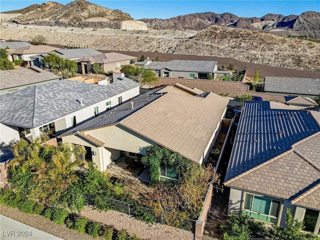 drone / aerial view with a residential view and a mountain view