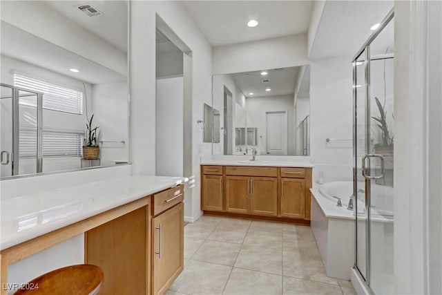 full bath featuring visible vents, a stall shower, vanity, tile patterned flooring, and a bath