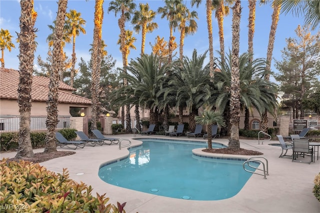 view of swimming pool featuring a patio