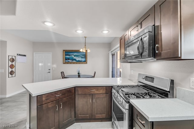 kitchen featuring decorative light fixtures, an inviting chandelier, dark brown cabinets, and gas range