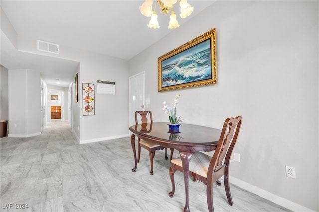 dining room with an inviting chandelier