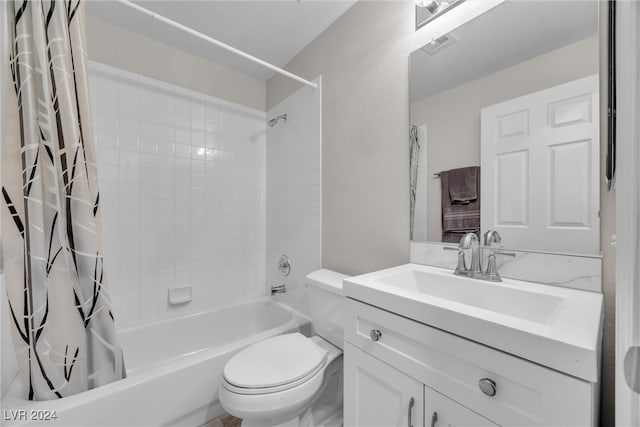 full bathroom with vanity, shower / bathtub combination with curtain, and toilet