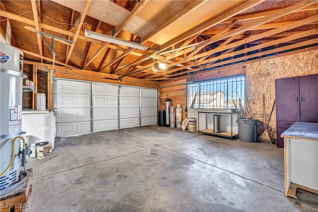 garage featuring secured water heater