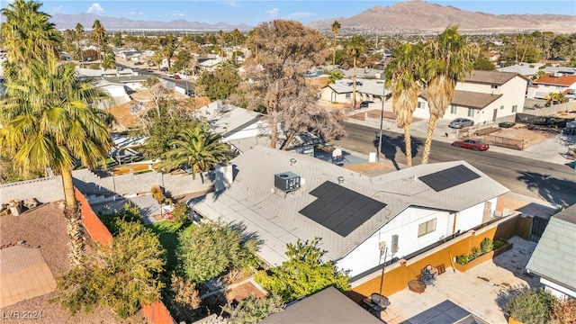 drone / aerial view featuring a mountain view