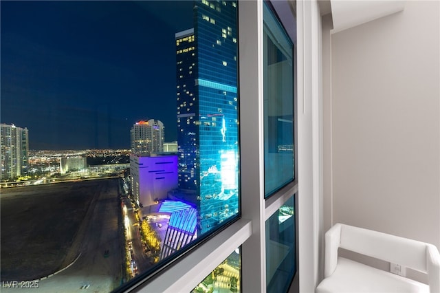 balcony at night with a view of city lights