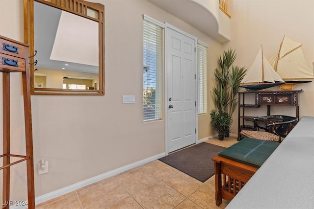 entrance foyer featuring light tile patterned floors