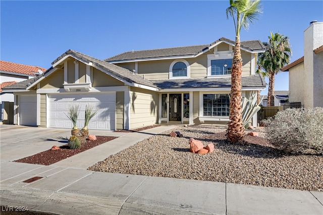 view of front property with a garage