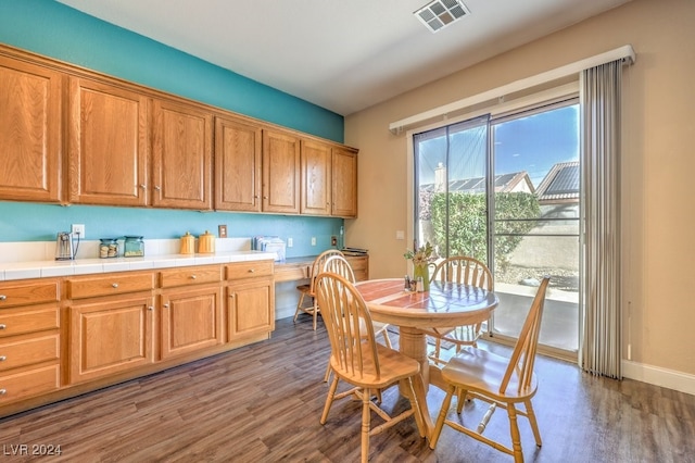 dining space featuring light wood-type flooring