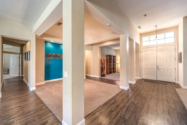 foyer with dark hardwood / wood-style flooring