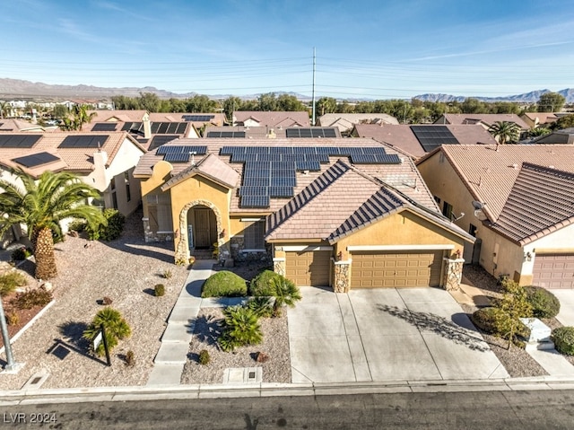 view of front of property with solar panels