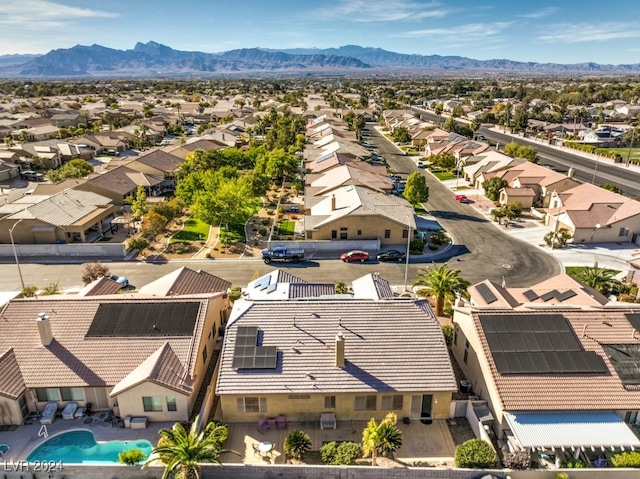 birds eye view of property featuring a mountain view