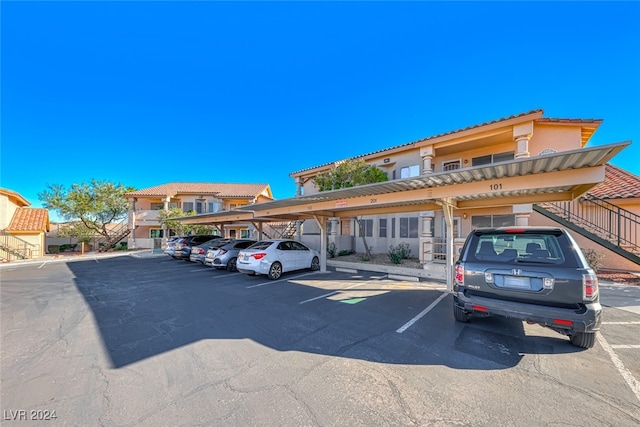 view of parking with a carport