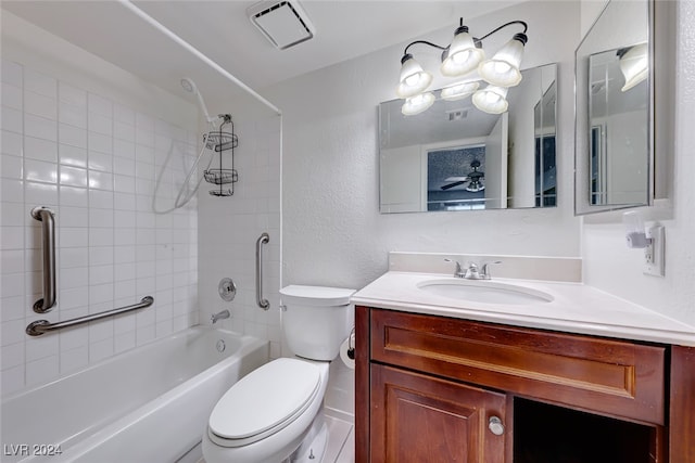 full bathroom with vanity, toilet, and tiled shower / bath combo