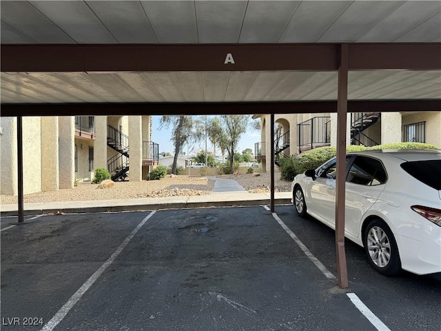 4464 W Desert Inn Rd Unit A, Las Vegas, NV 89102 - covered parking lot featuring stairs