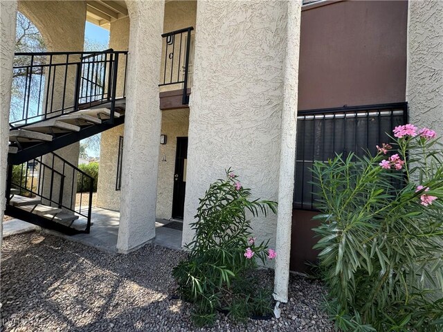 4464 W Desert Inn Rd Unit A, Las Vegas, NV 89102 - view of exterior entry featuring stucco siding