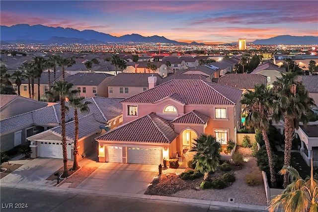 aerial view at dusk with a mountain view