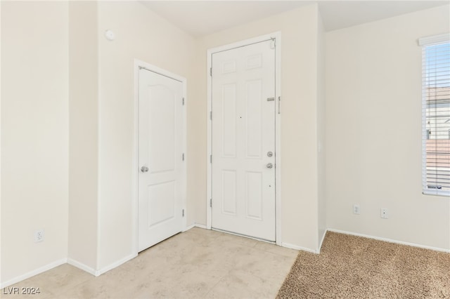 view of carpeted entryway