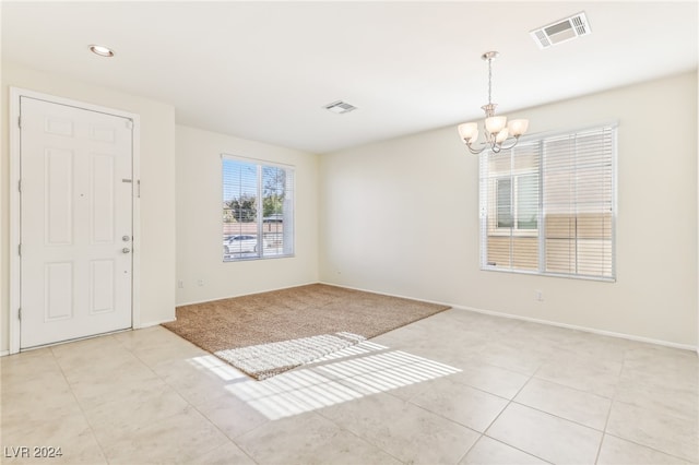 interior space featuring an inviting chandelier