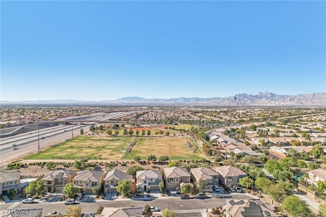 drone / aerial view featuring a mountain view