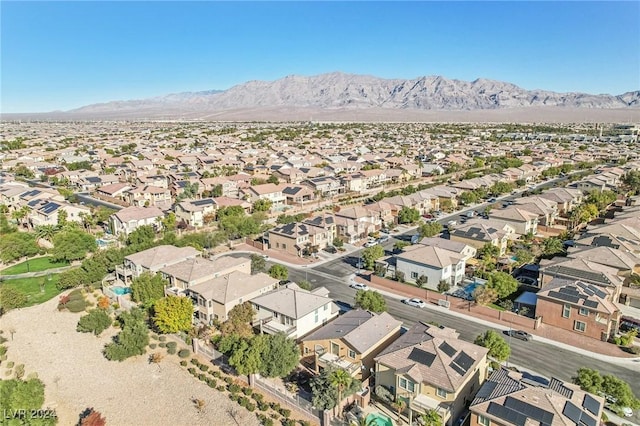 drone / aerial view featuring a mountain view