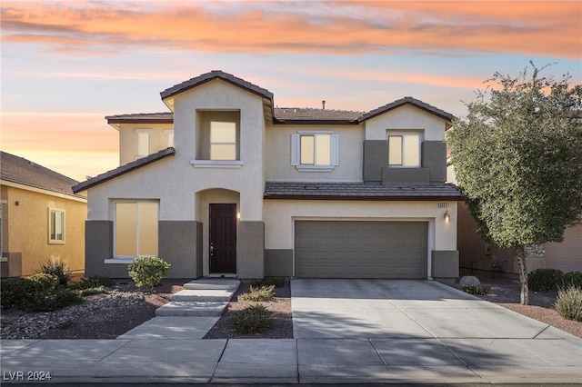 view of front of property featuring a garage