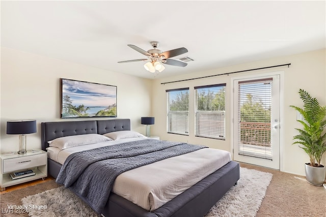 carpeted bedroom featuring access to outside and ceiling fan