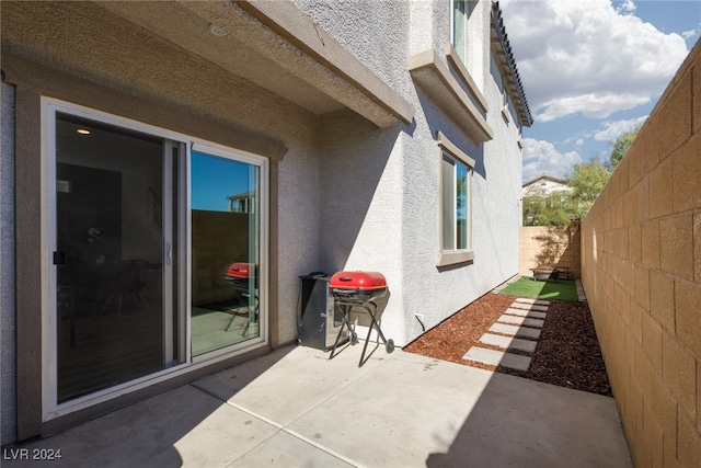 view of patio featuring a fenced backyard and area for grilling