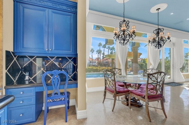 dining area featuring an inviting chandelier