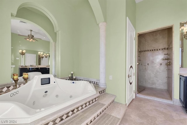 bathroom with decorative columns, vanity, separate shower and tub, ceiling fan, and tile patterned flooring