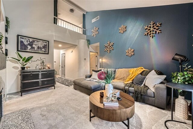 2133 Desert Pines St, Las Vegas, NV 89134 - living room featuring carpet floors and vaulted ceiling