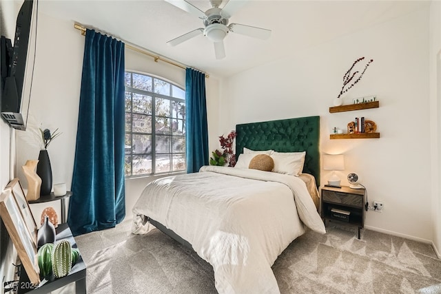 bedroom with light colored carpet and ceiling fan