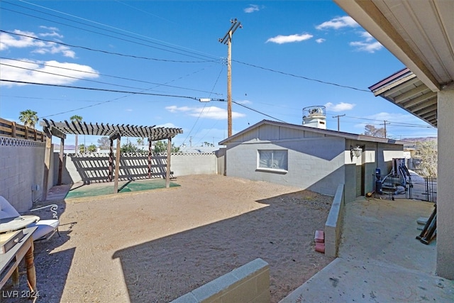 view of yard with a patio and a pergola