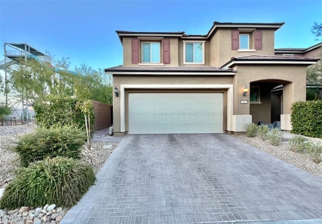 view of front of home with a garage