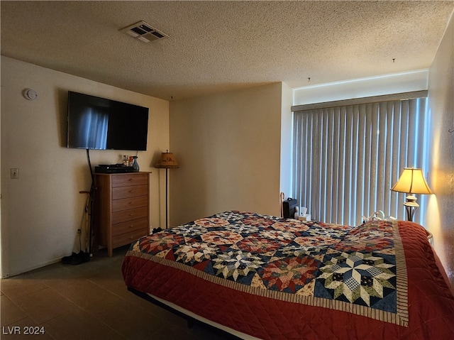 bedroom with a textured ceiling