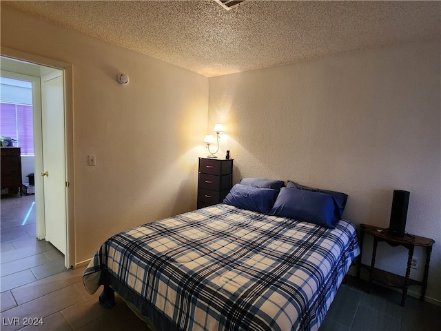 bedroom with a textured ceiling