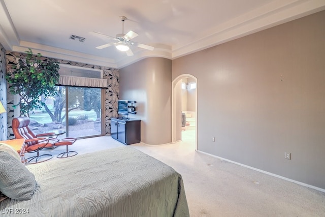 carpeted bedroom featuring ceiling fan and access to exterior