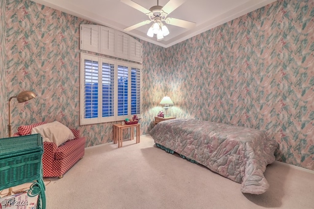 carpeted bedroom featuring ceiling fan