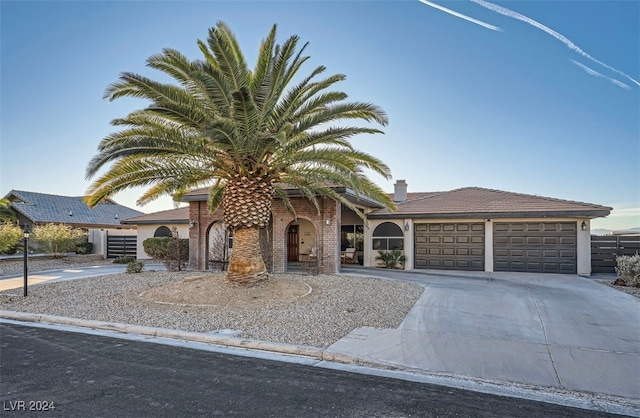 view of front of home with a garage