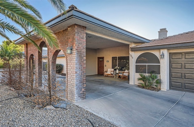 exterior space featuring a carport