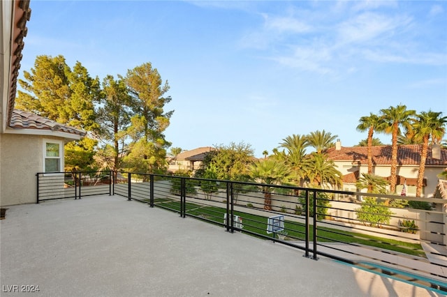 view of patio with a balcony